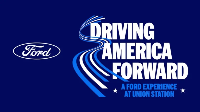 Promotional title card graphic on a solid dark blue background featuring the white Ford oval logo on the left and the white and light blue text reading Driving America Forward: A Ford Experience at Union Station on the right, accented by curved graphic lines resembling a winding road.