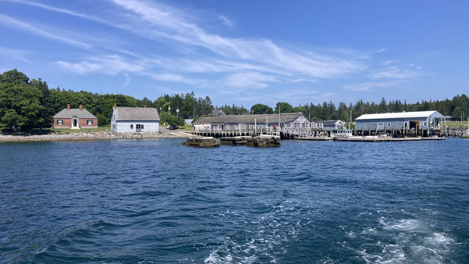 Historic dock and buildings of Islesford village on Little Cranberry Island viewed from the water