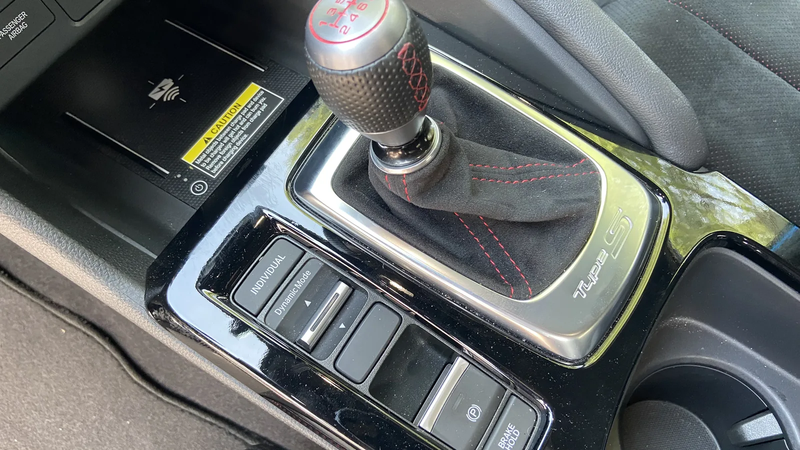 Six-speed manual shifter with a weighted metal knob inside the 2026 Acura Integra Type S.